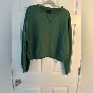 Green “Out from Under” boxy sweatshirt